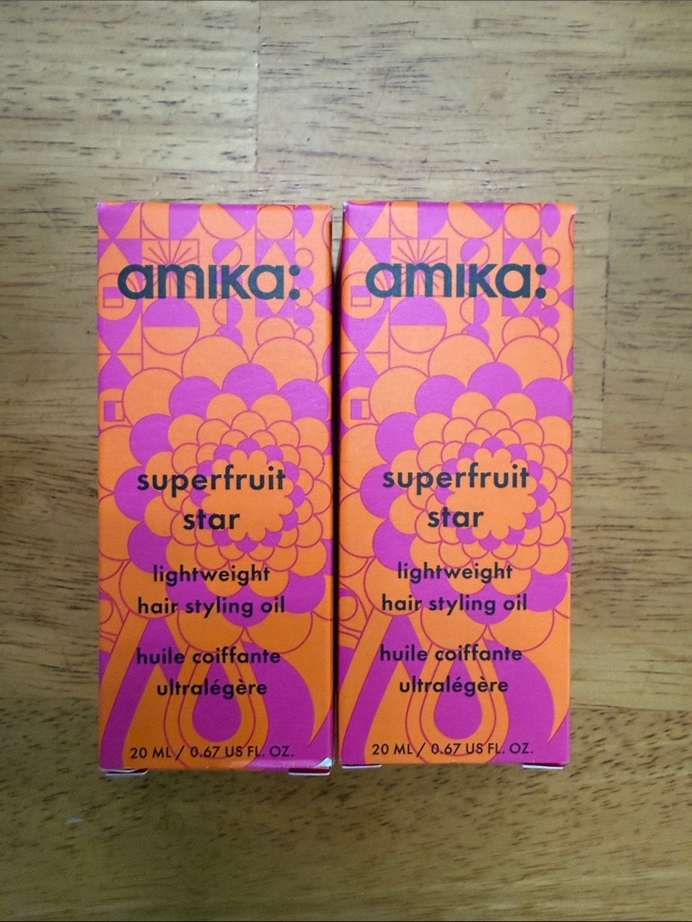 amika Superfruit Star Lightweight Hair Styling Oil - Orange, Pink
